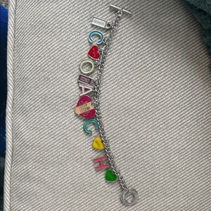 Coach Silver Tone Charm Bracelet with Multicolor Enamel Hearts and Letters